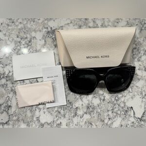 Michael Kors sunglasses.